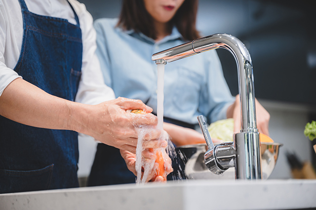woman and man who young couple cooking food in kitchen at home, people are happy together